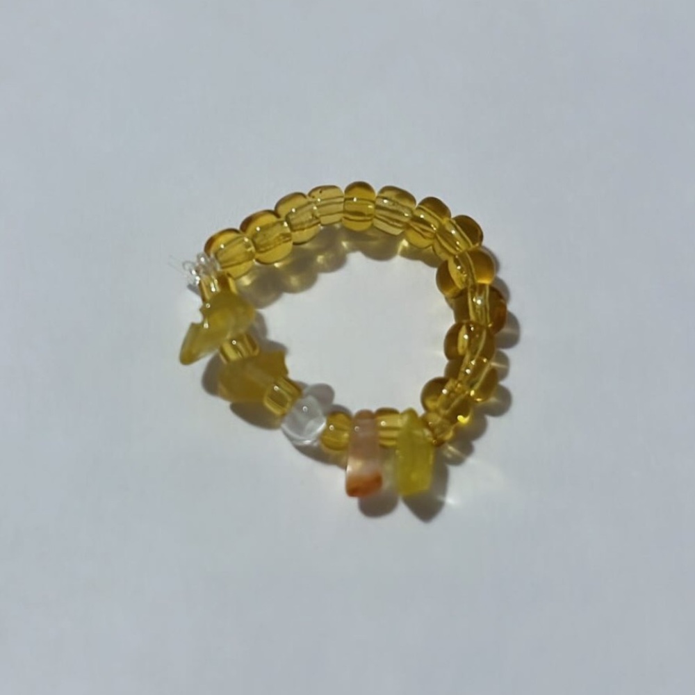 Golden ring with crystals.